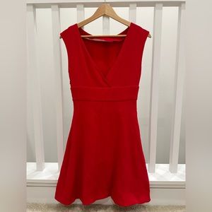 Miu Miu            
Bust:  15 in
Waist:  12.5 in
Hip:     13.5 in
Length:	34 in